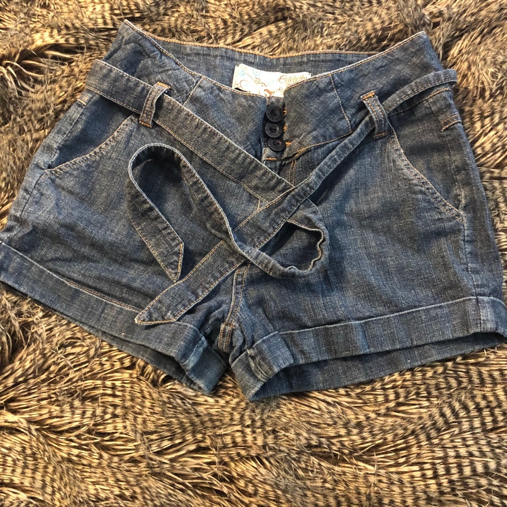 High waisted, belted jean shorts